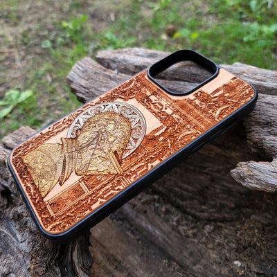 Hand-finished cherry wood phone case with detailed laser engraving, perfect for iPhone & Samsung Galaxy users.