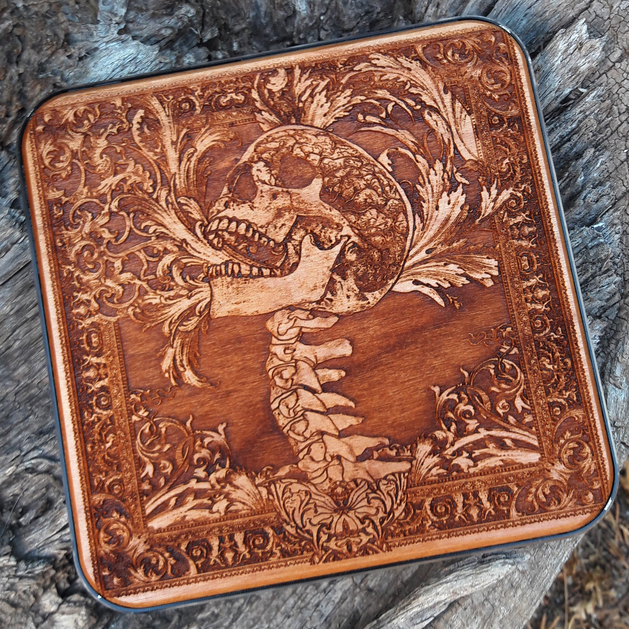 Close-up of human skull dark art design on wireless charger – perfect for iPhone & Galaxy