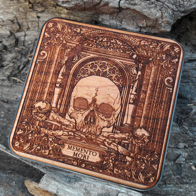Wooden wireless charger featuring vanitas-inspired dark art.