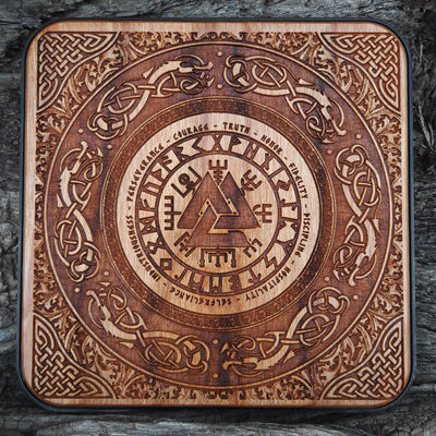 Hand-painted wooden wireless charger with Viking helmet design.